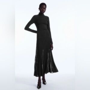 PLEATED KNITTED TURTLENECK MAXI DRESS